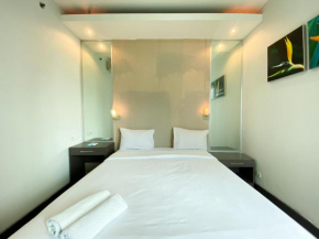 Homey 2BR Apartment Crown Court Executive Condominium By Travelio